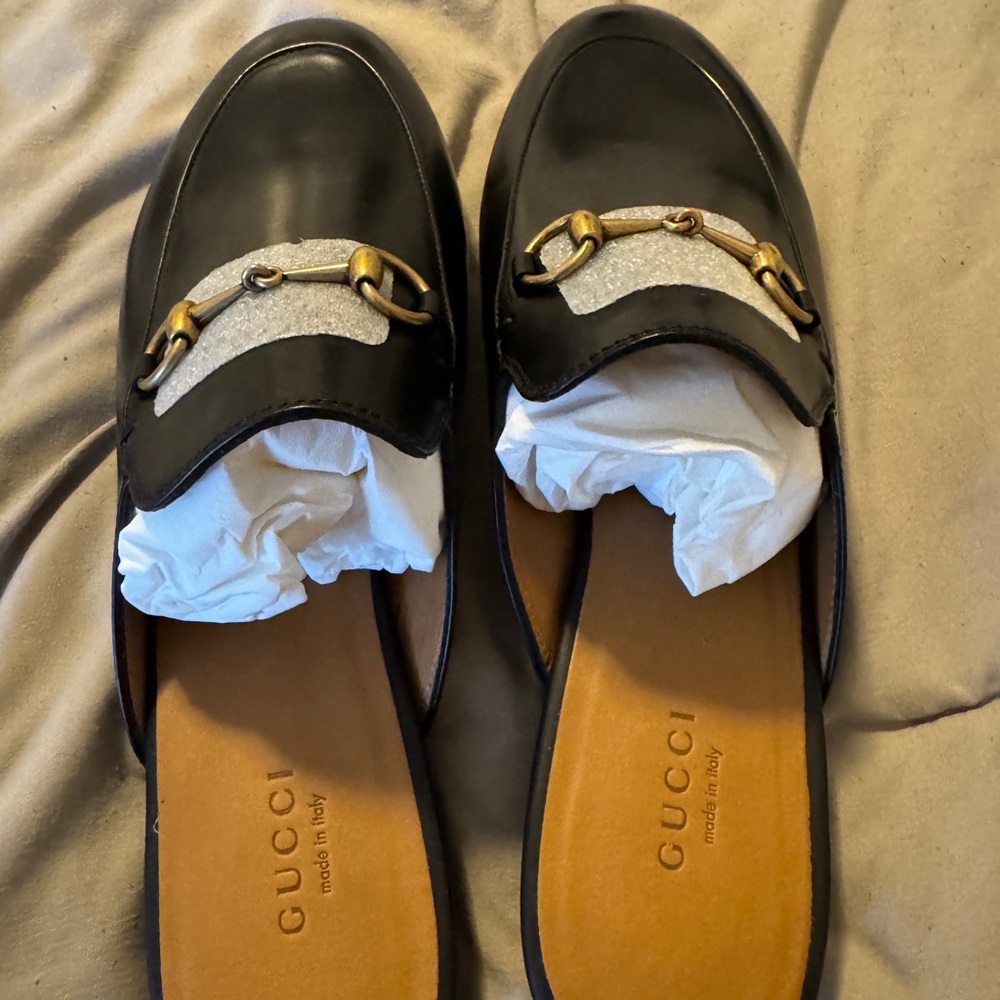 Gucci Women's Black Leather Loafers with Gold Accents